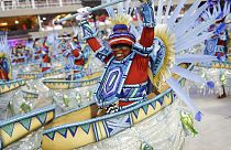 Performers from the Portela samba school parade during Carnival celebrations at the Sambadrome in Rio de Janeiro, Brazil.