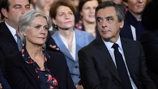 François Fillon with his wife Penelope at an election campaign rally in Paris, January 2017. 