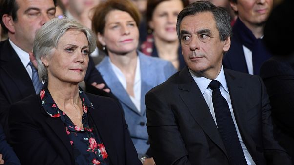 François Fillon with his wife Penelope at an election campaign rally in Paris, January 2017. François Fillon with his wife Penelope at an election campaign rally in Paris, January 2017.