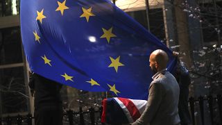The UK flag is removed from the European Parliament in Brussels, January 31, 2020, the day the UK left the EU. (AP Photo/Francisco Seco)