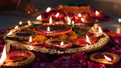 Flowers and candles during Diwali. Flowers and candles during Diwali.