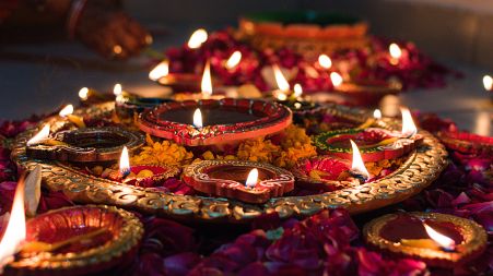 Flowers and candles during Diwali.
