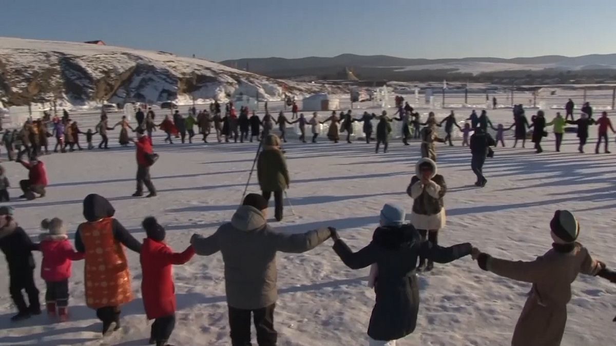 On a frozen Siberian lake, festival-goers mark the Lunar New Year