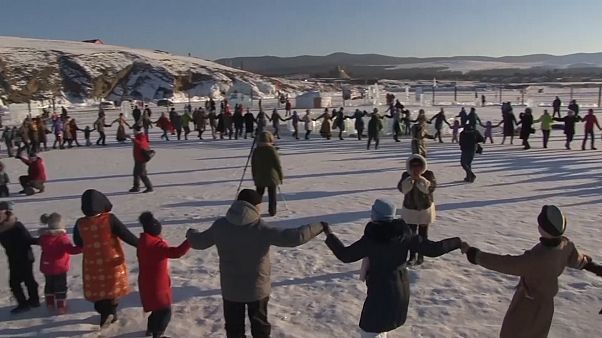 On a frozen Siberian lake, festival-goers mark the Lunar New Year On a frozen Siberian lake, festival-goers mark the Lunar New Year