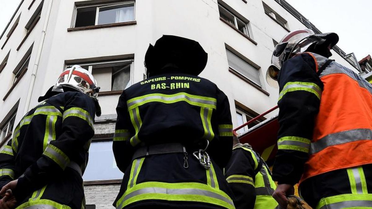 Firefighters at the scene of the Strasbourg fire that prosecutors believe could have been deliberate