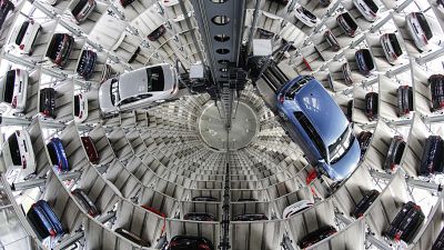 In this April 28, 2016 file photo Volkswagen cars are presented to media inside a delivery tower in Wolfsburg, Germany.