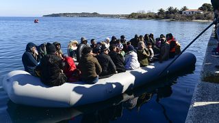 Local residents prevent migrants from reaching the small port of Thermi, on the Greek island of Lesbos.