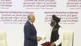 Anlaşmayı ABD’nin Afganistan Özel Temsilcisi Zalmay Halilzad ile Taliban Siyasi Ofis Başkanı Molla Abdulgani Berader imzaladı