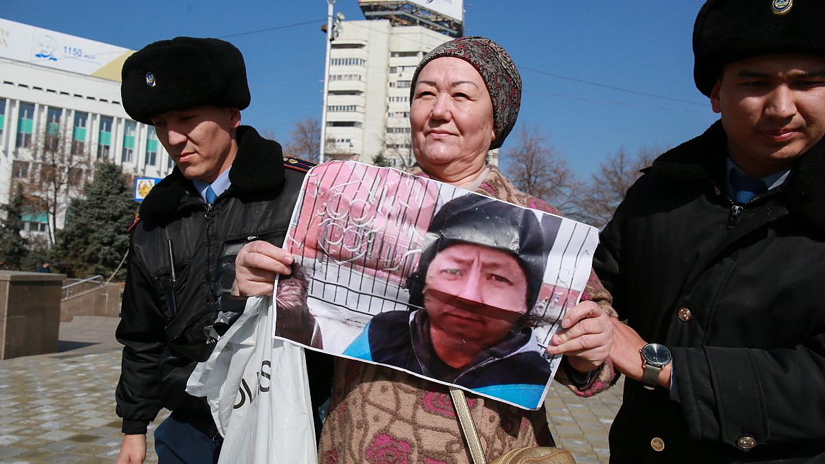 Police in Kazakhstan detain dozens after activist's death