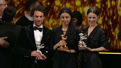 Elio Germano and Paula Beer with their Silver Bears, surrounding Alireza Zareparast, actress from "There Is No Evil", Golden Bear