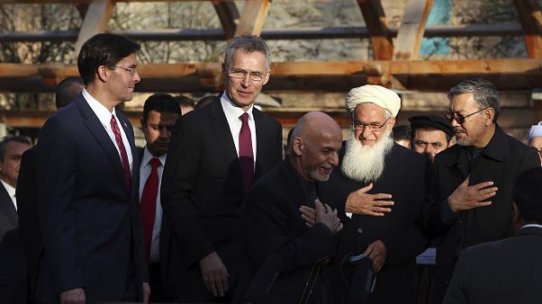 Afghan President Ashraf Ghani, center, arrives with NATO Secretary General Jens Stoltenberg, and U.S. Secretary of Defense Mark Esper for a joint news conference, Feb 29, 2020 Afghan President Ashraf Ghani, center, arrives with NATO Secretary General Jens Stoltenberg, and U.S. Secretary of Defense Mark Esper for a joint news conference, Feb 29, 2020