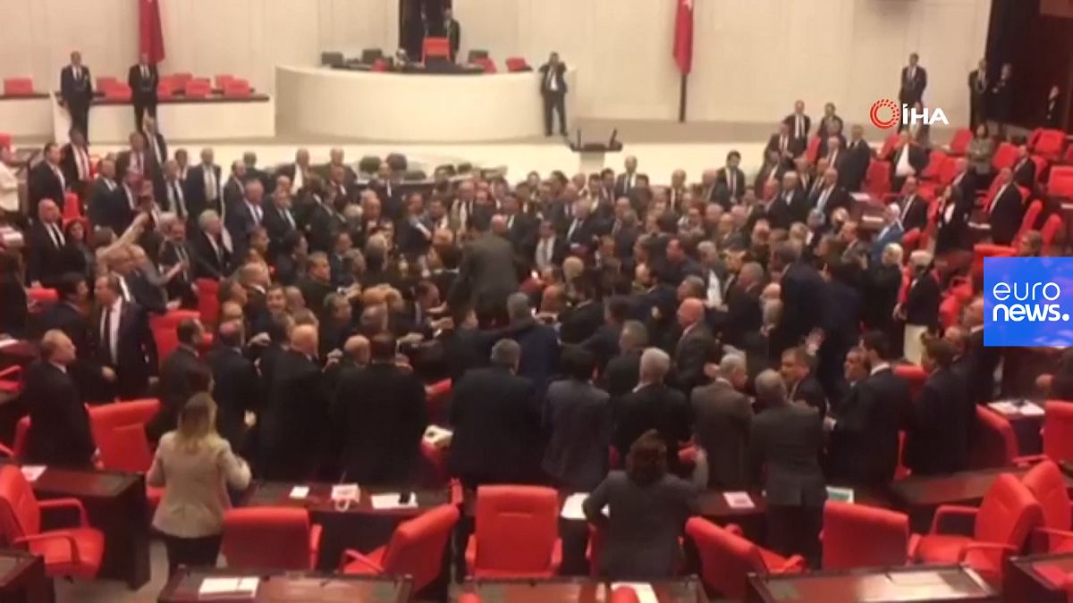 Various of legislators brawling during session at the Grand National Assembly of Turkey.