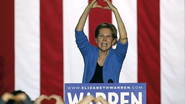 Massachusetts Senator Elizabeth Warren makes the shape of a heart Massachusetts Senator Elizabeth Warren makes the shape of a heart
