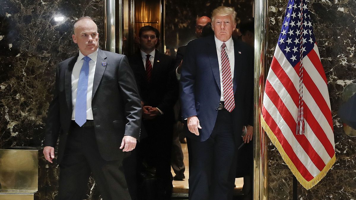 President Donald Trump steps out of the elevator to speak to the media in the lobby of Trump Tower in New York