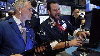 Traders work on the floor of the New York Stock Exchange, March 3, 2020.