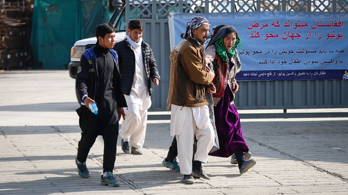 Gunmen attack a political gathering in Kabul, killing at least 27 people, injuring dozens