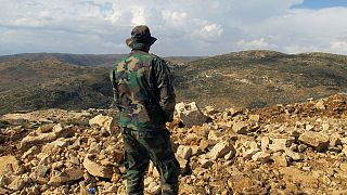 یکی از جنگجویان هوادار بشار اسد، رئیس جمهوری سوریه در سوریه