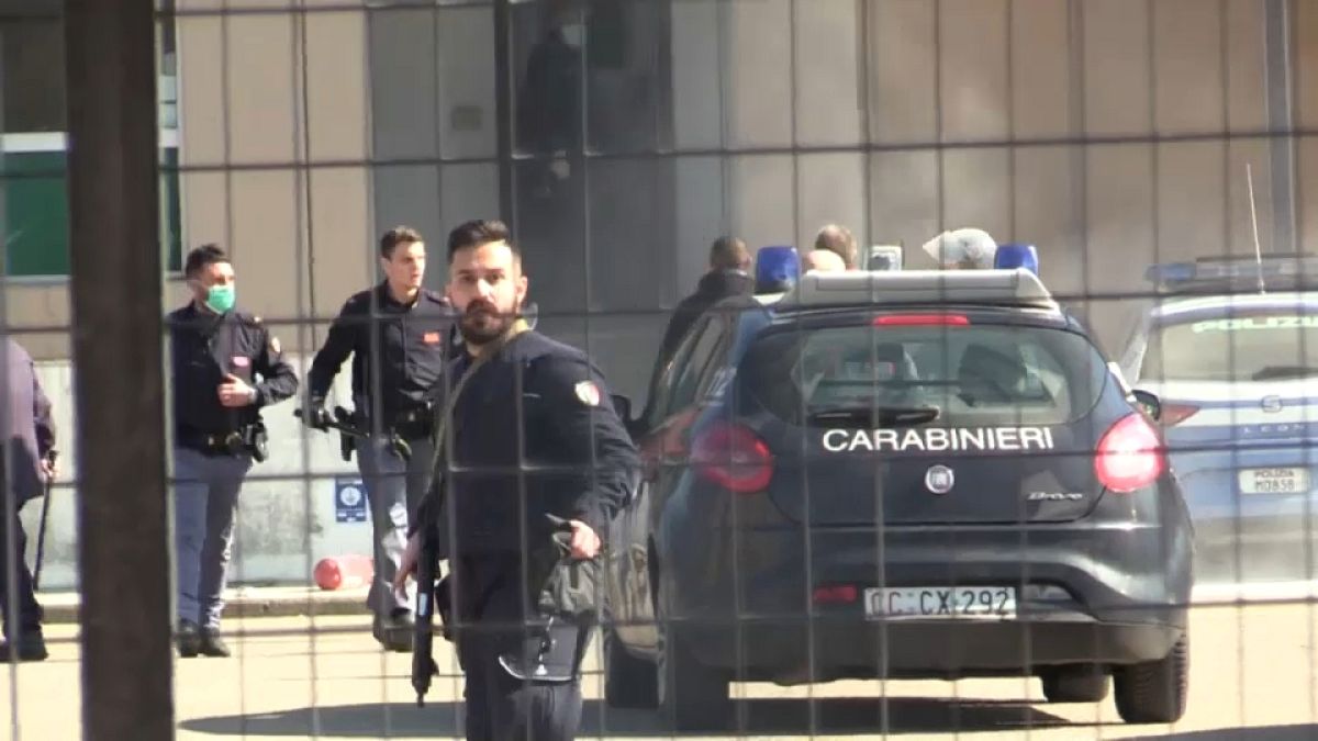 Carabinieri begin to free hostages after a prison riot in Modena, near Bologna, Italy 