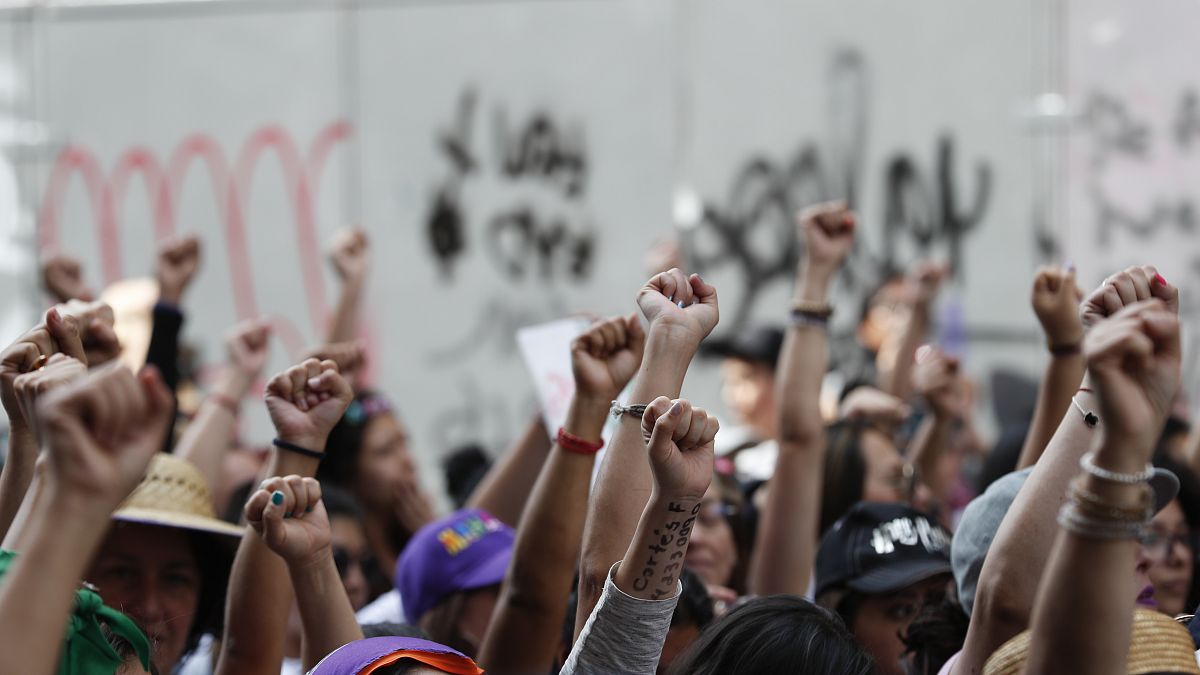 Women march during International Women's Day in Mexico City, Sunday, March 8, 2020.