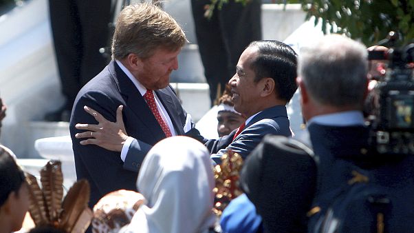 King Willem-Alexander of the Netherlands is welcomed by Indonesian President Joko Widodo on his arrival at the presidential palace in Bogor. King Willem-Alexander of the Netherlands is welcomed by Indonesian President Joko Widodo on his arrival at the presidential palace in Bogor.