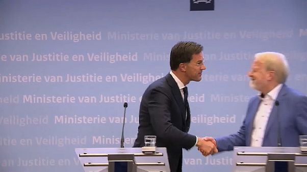 Dutch PM Mark Rutte shakes hands after delivering a speech in which he told citizens to stop handshakes to prevent the spread of COVID-19 Dutch PM Mark Rutte shakes hands after delivering a speech in which he told citizens to stop handshakes to prevent the spread of COVID-19