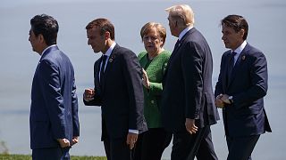 From left, Japanese Prime Minister Shinzo Abe, French President Emmanuel Macron, Merkel, Trump, and Italian Prime Minister Giuseppe Conte