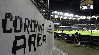 Eintracht fans have taped letters at a wall of the stadium during a Europa League round of 16, 1st leg soccer match between Eintracht Frankfurt and FC Basel.