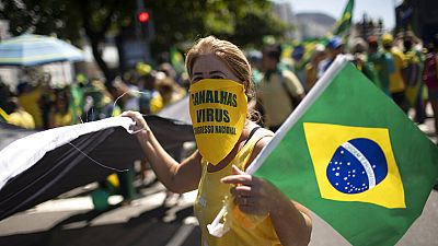 شاهد: آلاف البرازيليين يحتشدون لدعم رئيسهم بالرغم من فيروس كورونا