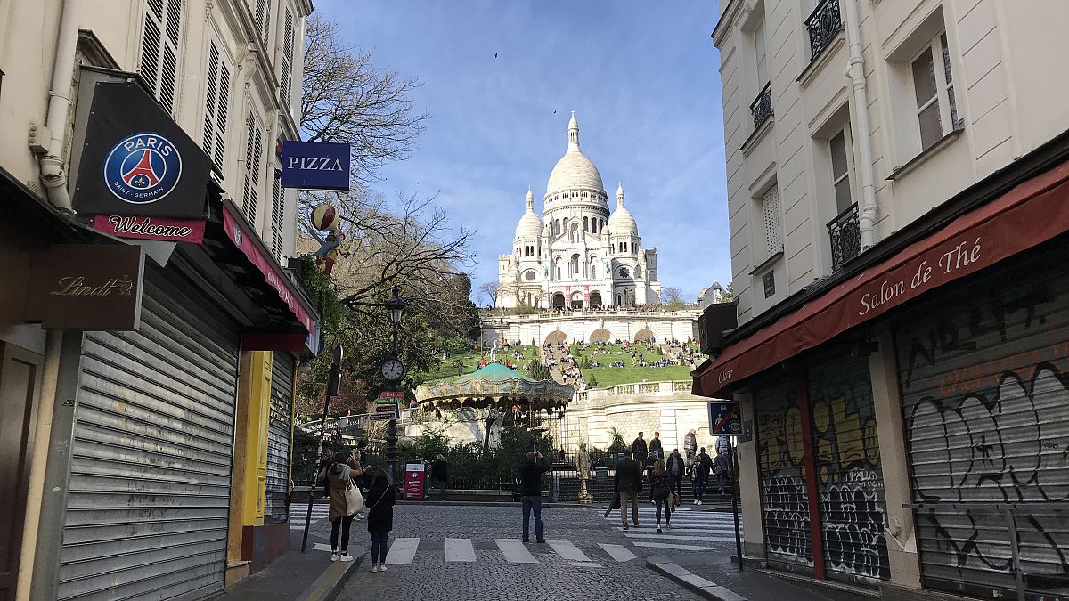 Some local businesses shut near Sacré-Cœur Basilica in Paris. The landmark remains popular among visitors, despite the fears of coronavirus spreading. 15 March, 2020.