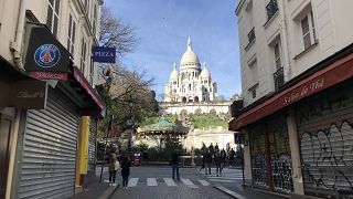 Some local businesses shut near Sacré-Cœur Basilica in Paris. The landmark remains popular among visitors, despite the fears of coronavirus spreading. 15 March, 2020.