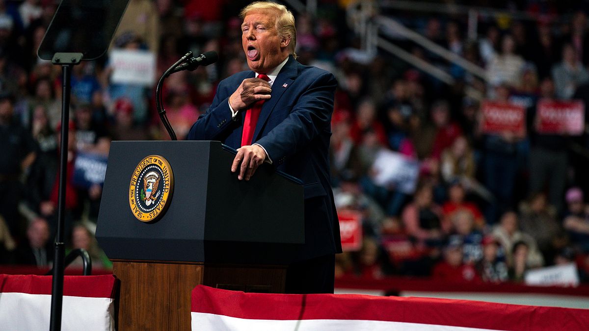 President Donald Trump makes a joke as he speaks during a campaign rally at Bojangles Coliseum, Monday, March 2, 2020, in Charlotte, N.C. (AP Photo/Evan Vucci) 

