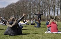 An outdoor music lesson at the Korshoejskolen in Randers, Denmark, Wednesday, April 15, 2020, as the country begins to relax its strict coronavirus lockdown measures.