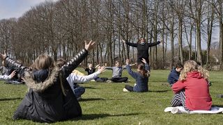 An outdoor music lesson at the Korshoejskolen in Randers, Denmark, Wednesday, April 15, 2020, as the country begins to relax its strict coronavirus lockdown measures.