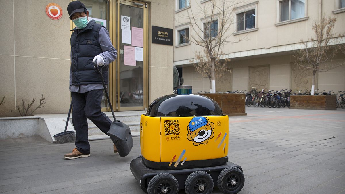 Virus Outbreak China Robot Maker