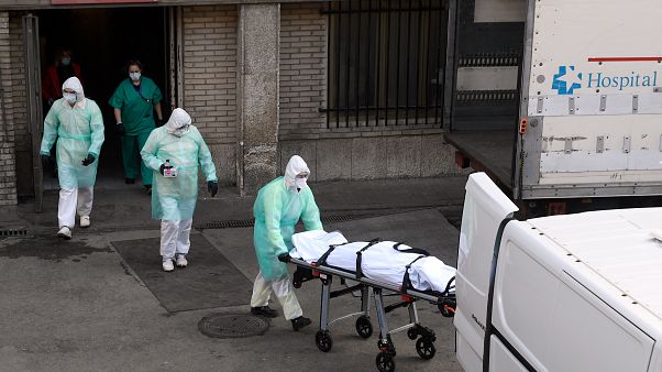 Health workers at a Madrid hospital on March 25, 2020.