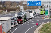 Drivers wait in the traffic jams on the A4 motorway towards Hungary. (Photo by ALEX HALADA / AFP)