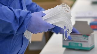 Detainees make medical face masks at the Hajdu-Bihar County Penitentiary in Debrecen, Hungary, Thursday, March 26, 2020.