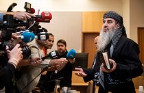 Mullah Krekar faces the media in a District Court in Oslo, Norway, Wednesday July 17, 2019.