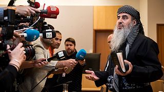 Mullah Krekar faces the media in a District Court in Oslo, Norway, Wednesday July 17, 2019. 