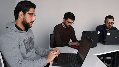 Students at University of Mosul translating Wikipedia content from English into Arabic