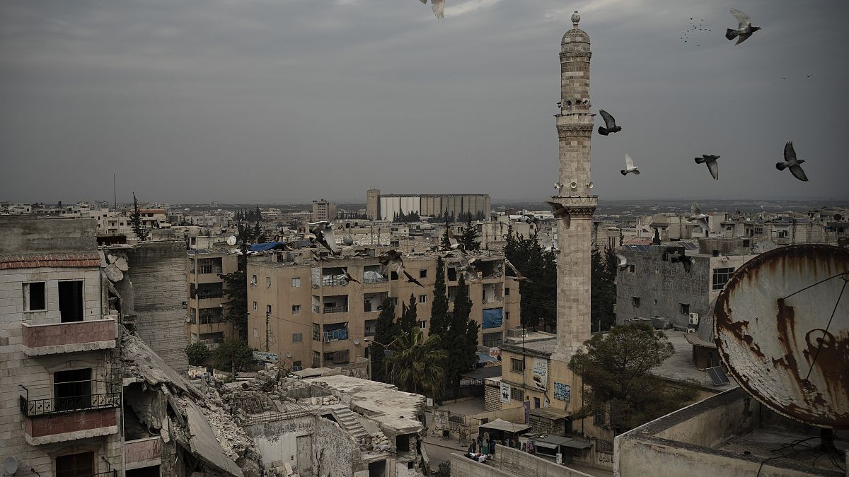 Damaged buildings in Idlib, Syria, just one of many cities ruined by a decade of war