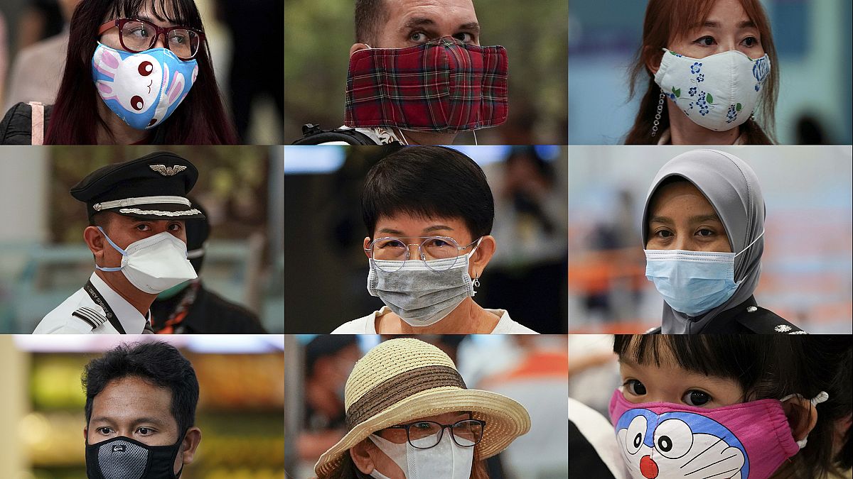 APTOPIX China Outbreak Masks