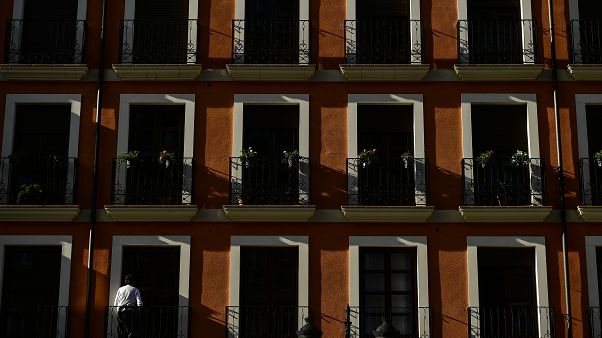 A
              man leaves the balcony of building during lockdown against
              the spread of coronavirus COVID-19, in Logrono northern
              Spain, Saturday, March 28, 2020.