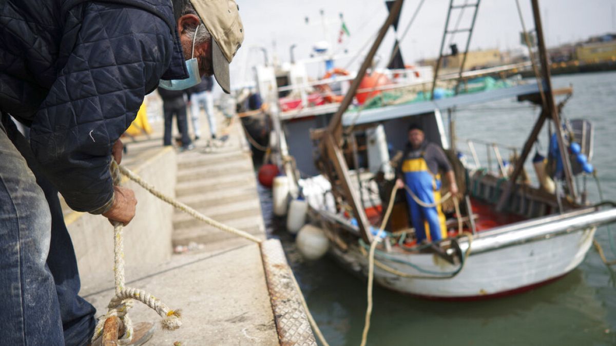 Virus Outbreak Italian Fishermen Photo Gallery