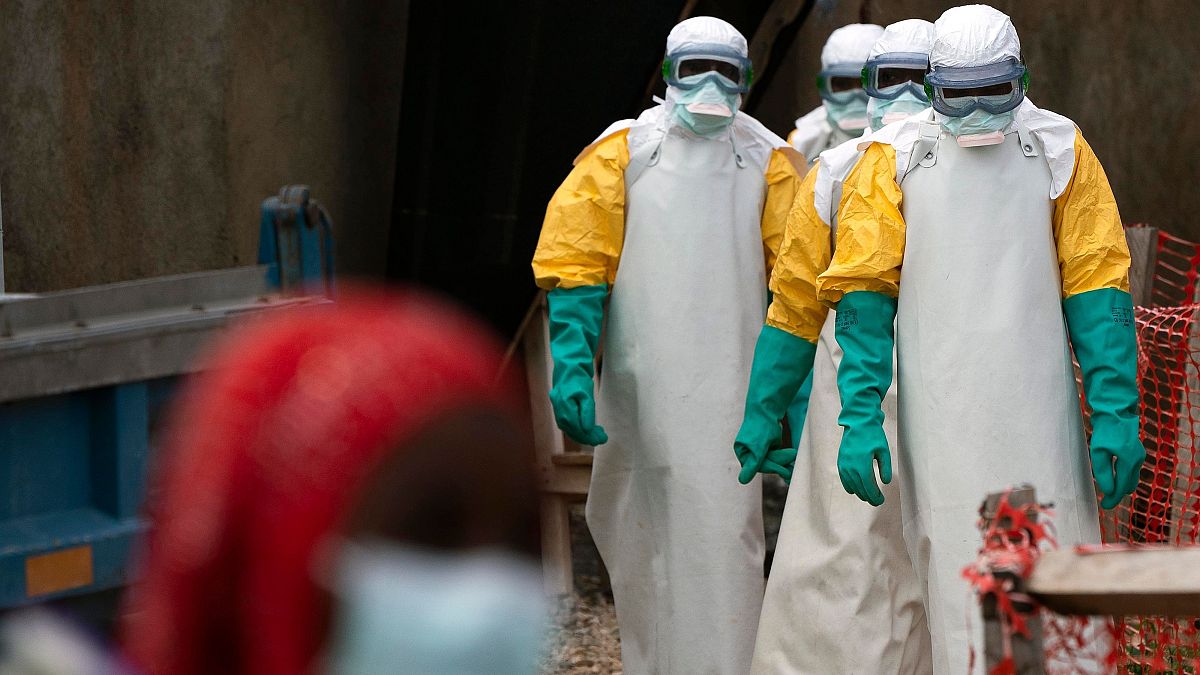 Health workers at an Ebola treatment center in Beni, Congo DRC, in 2019