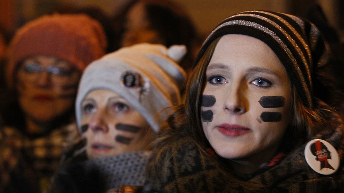 Women protest a tightening of abortion laws in Warsaw in 2017.