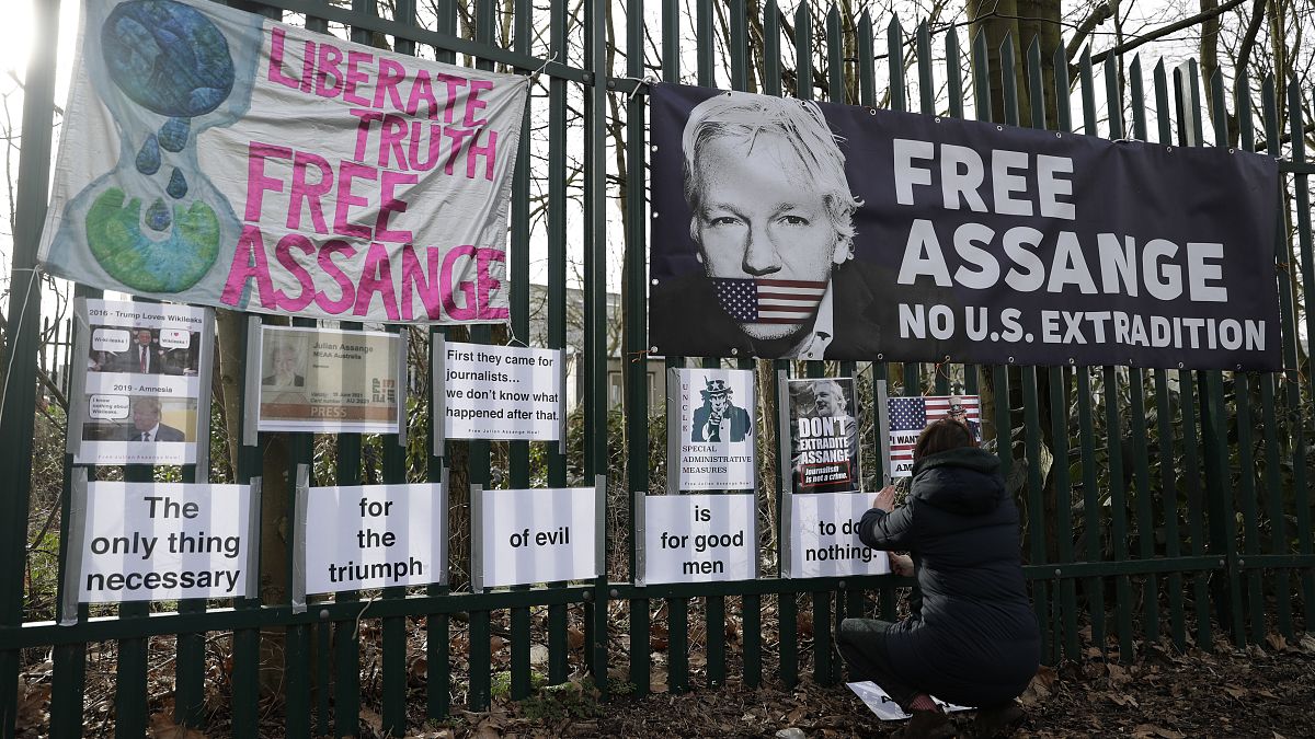 Julian Assange's partner revealed Saturday that she had two children with him while he lived inside the Ecuadorian Embassy in London.