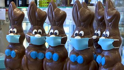 Coronavirus in Europe: Mask-wearing chocolate bunnies bring rare bit of joy amid lockdown