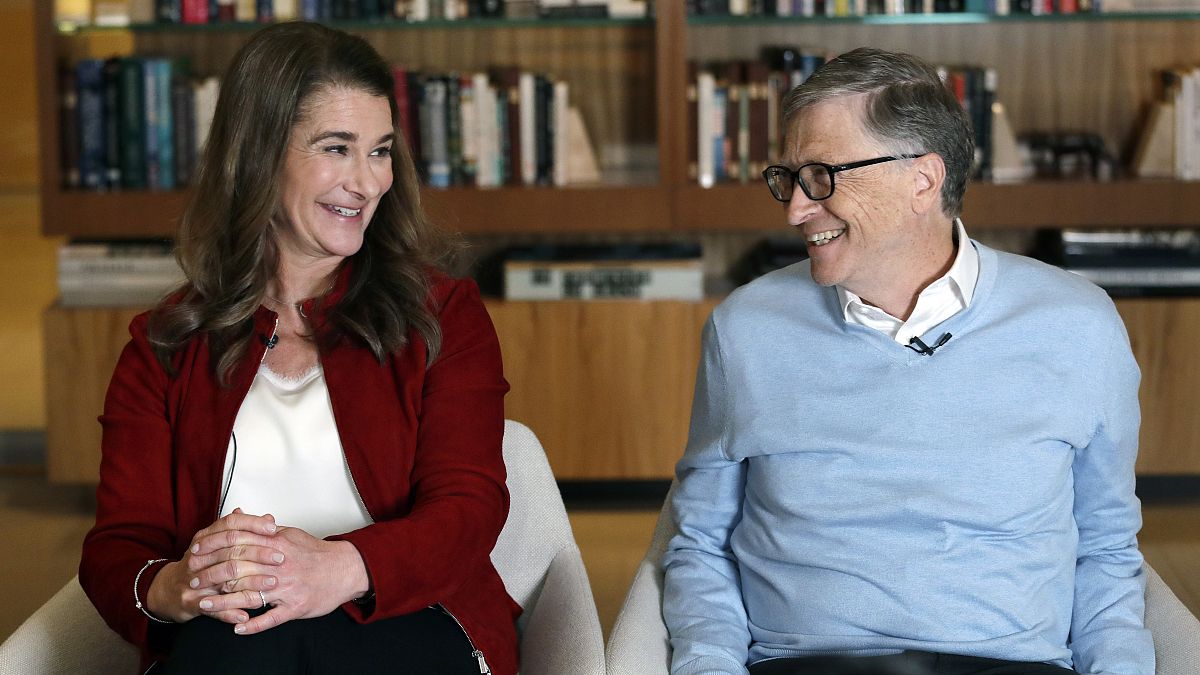 In this Feb. 1, 2019, file photo, Bill and Melinda Gates look toward each other and smile while being interviewed in Kirkland, Wash.