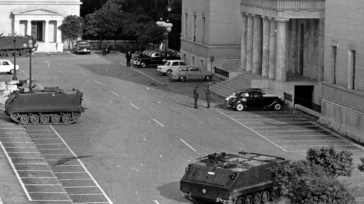 Tanks and troops stand guard outside the Parliament building in Athens, Greece, April 22, 1967,